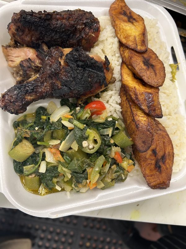 Jerk chicken with white rice and fried plantains