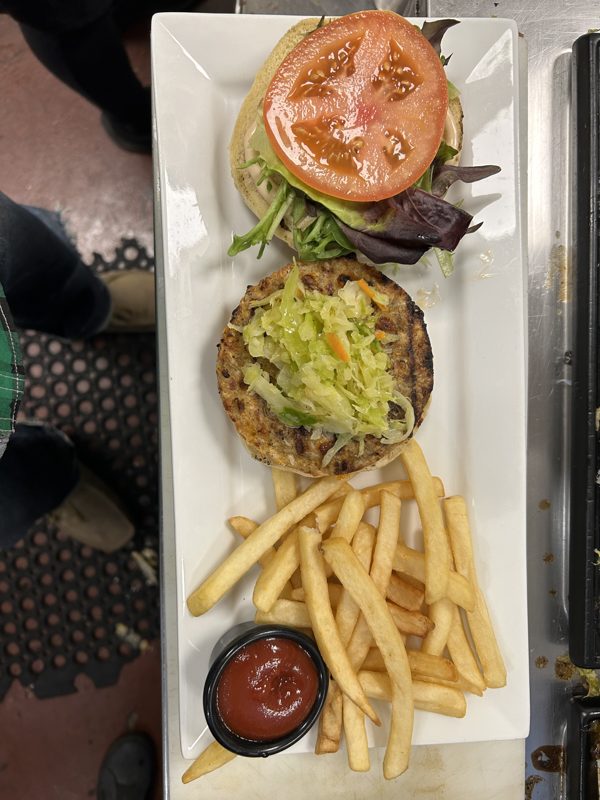 Caribbean burger with slaw and fries