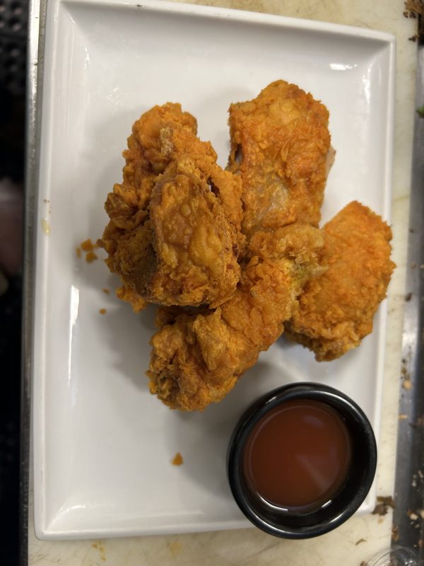 Golden fried chicken with dipping sauce
